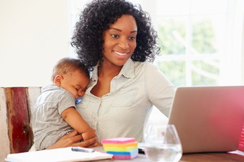 Mother-With-Baby-Working-In-Office-At-Home.jpg
